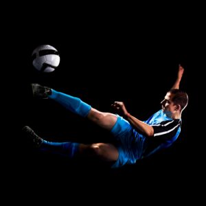 Soccer Player Doing Air kick